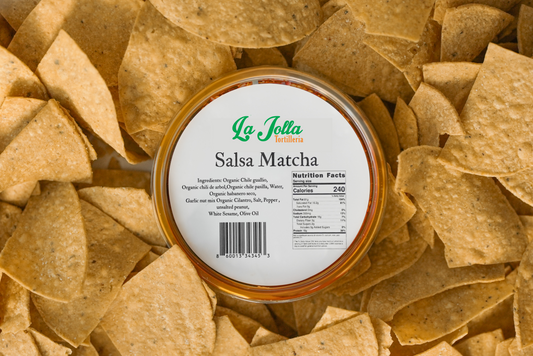 La Jolla Salsa Matcha – 7 oz container of rich, handcrafted Mexican chili oil made with organic guajillo, árbol, pasilla, and habanero chiles, garlic nut mix, white sesame, unsalted peanuts, organic cilantro, and olive oil; bold, smoky, spicy flavor perfect for tacos, grilled meats, rice, and dipping.